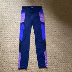 Athleta girl leggings with mesh sidings.